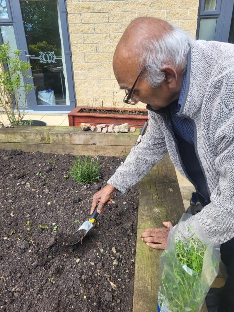 Resident doing gardening