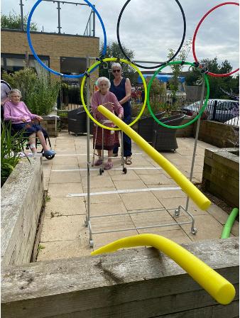 residents playing javelin game