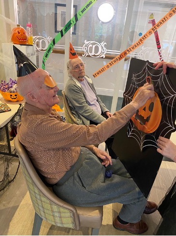 residents playing halloween games