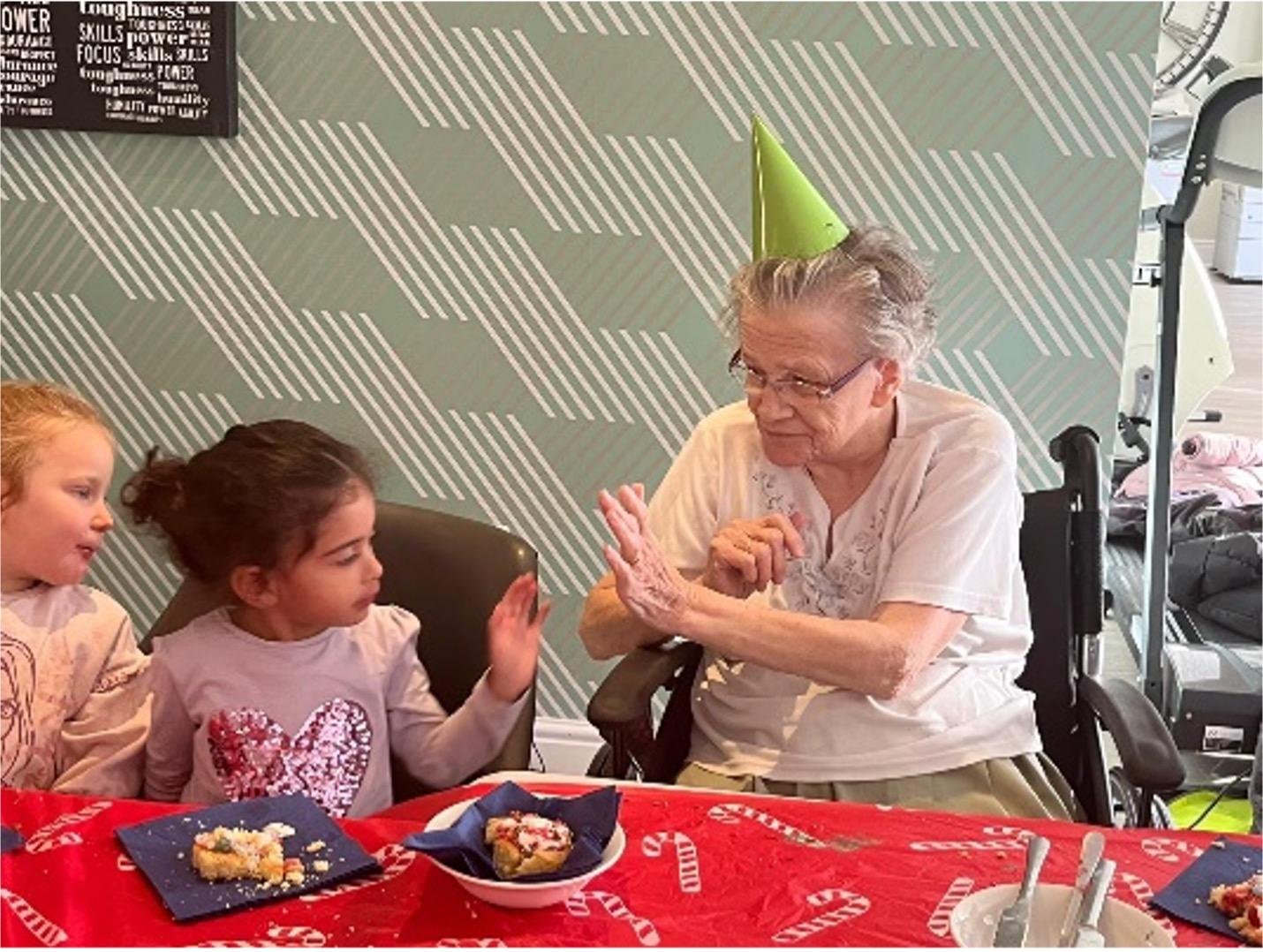 residents interacting with kids from the school