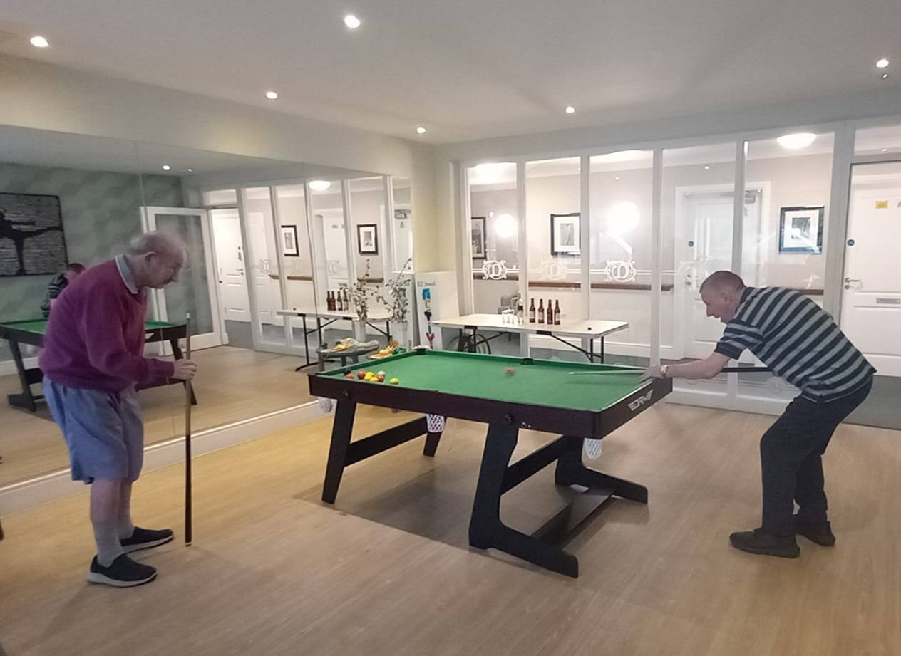 residents playing pool